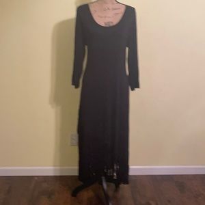 Black dress with fringed bottom.